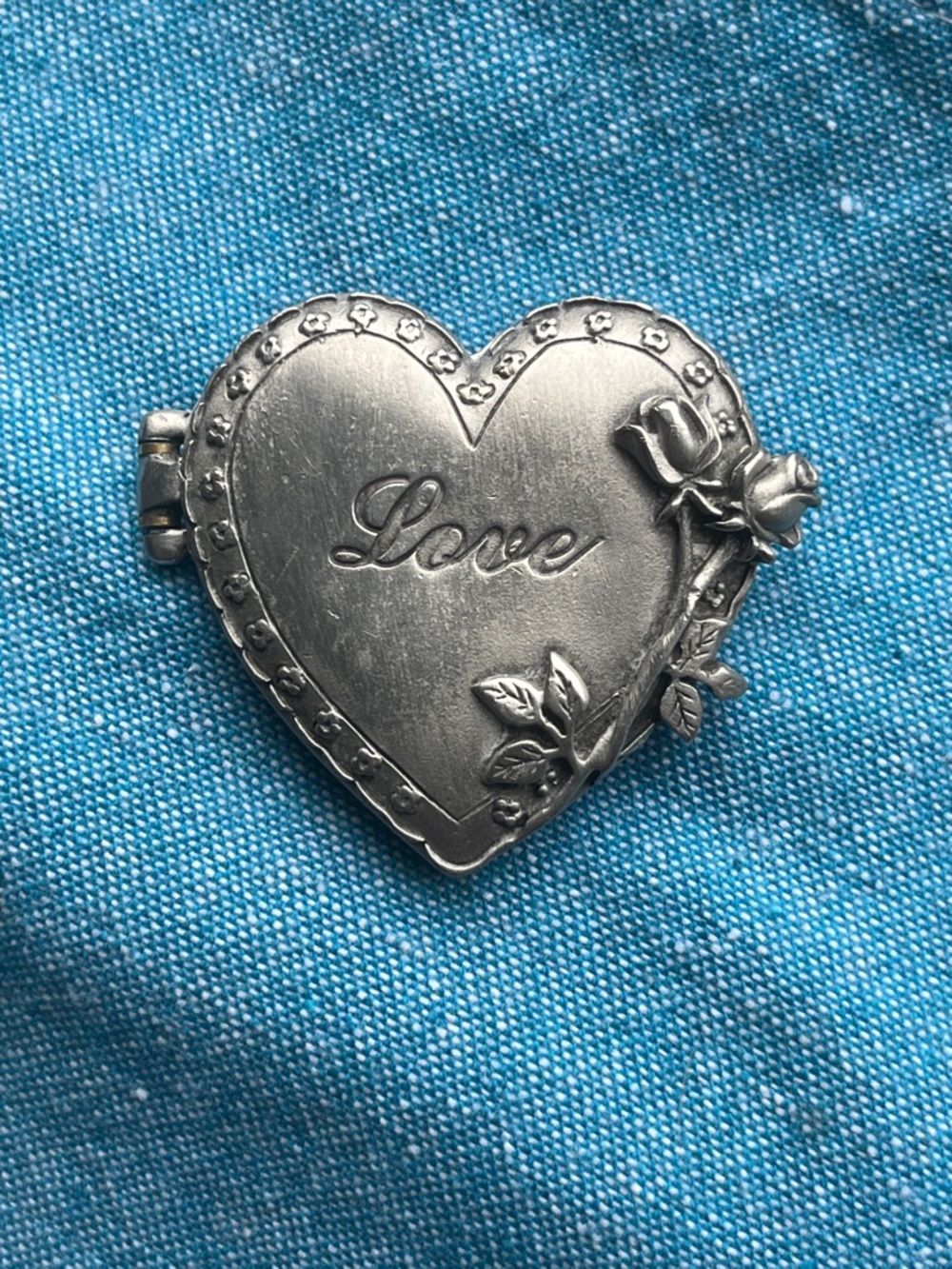 Vintage JJ Jonette Pewter
Finish Heart Locket Pin with 'Love’  Rose